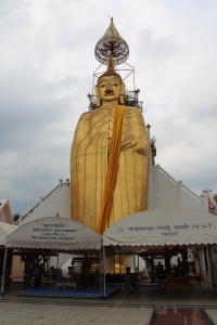 A 70ft gold plated standing buddha statue and temple 